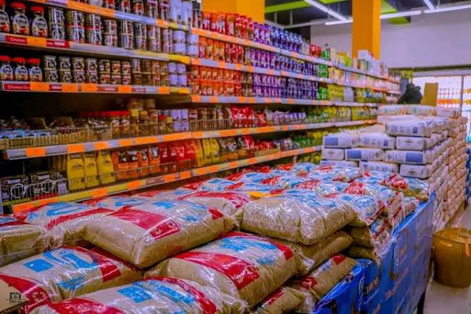 Well-stocked grocery aisles at a Magunas Supermarket outlet